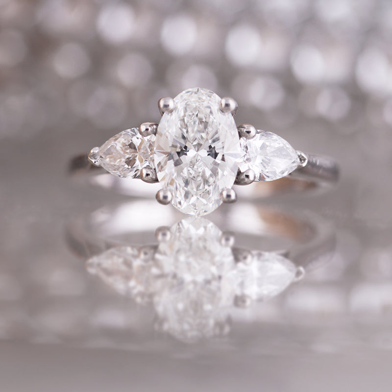 Oval & Pear Three Stone Engagement Ring