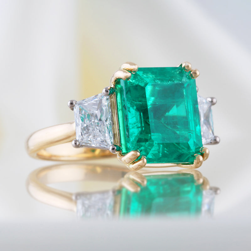 Beryl Emerald & Trapezoid Cut Diamond Three Stone Ring