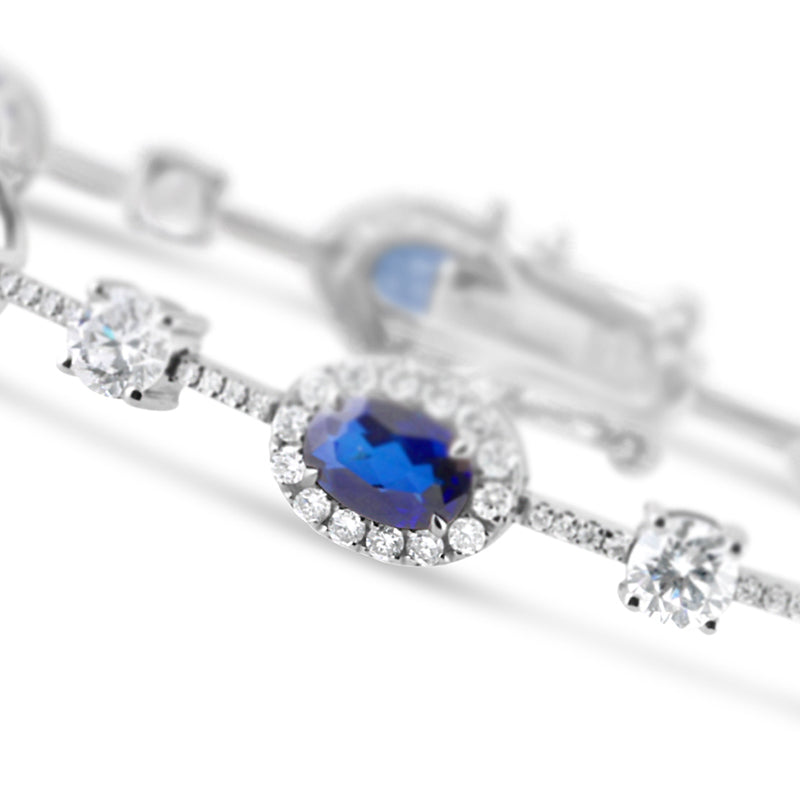 Oval Sapphire Halo & Round Cut Diamond Station Bracelet