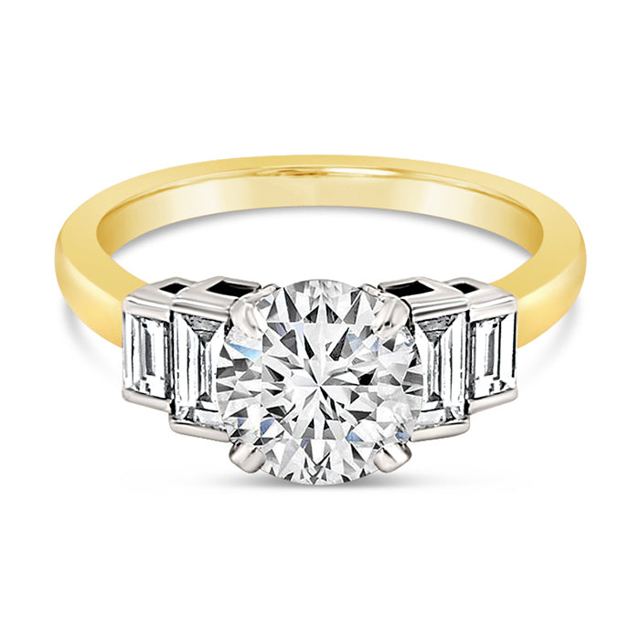 Round Brilliant Solitaire with Baguette Side Stones