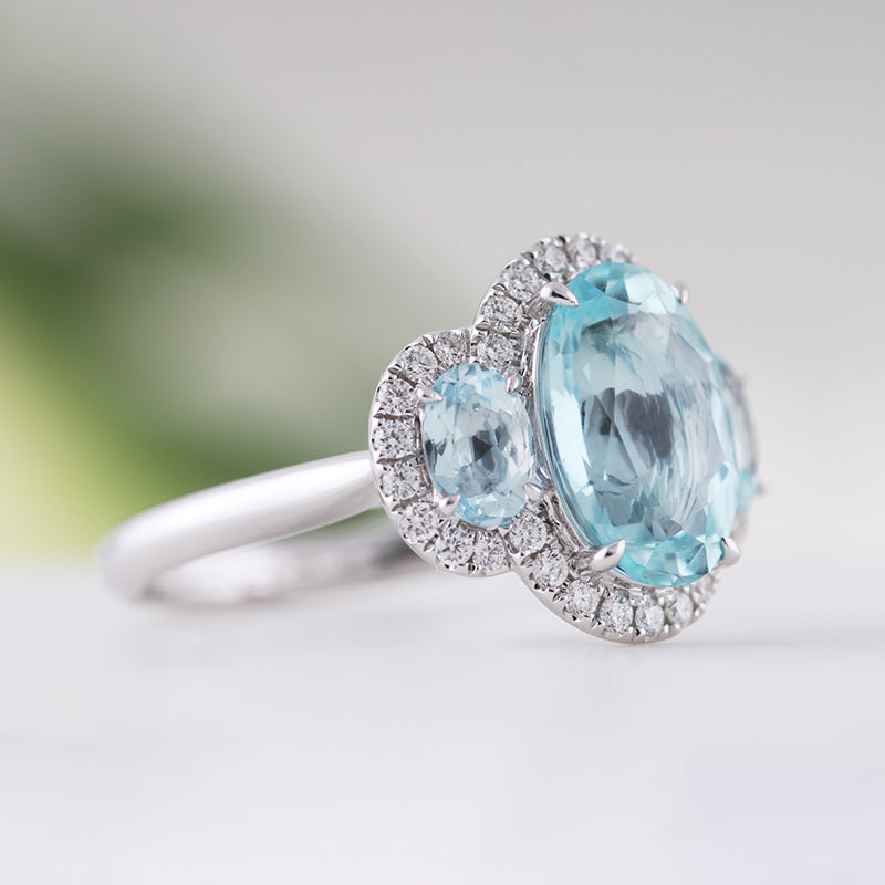 Oval Aquamarine & Diamond Three Stone Halo Ring