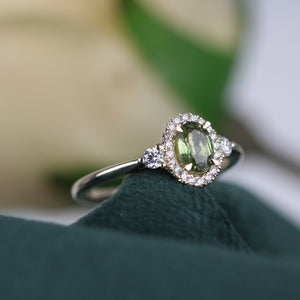 Green Sapphire & Diamond Halo Three Stone Ring