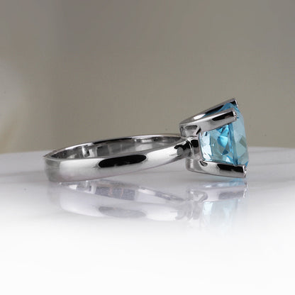 Blue Topaz &amp; Diamond Ring