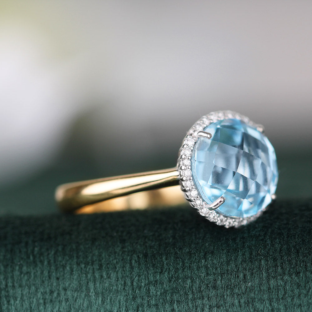 Blue Topaz &amp; Diamond Halo Ring