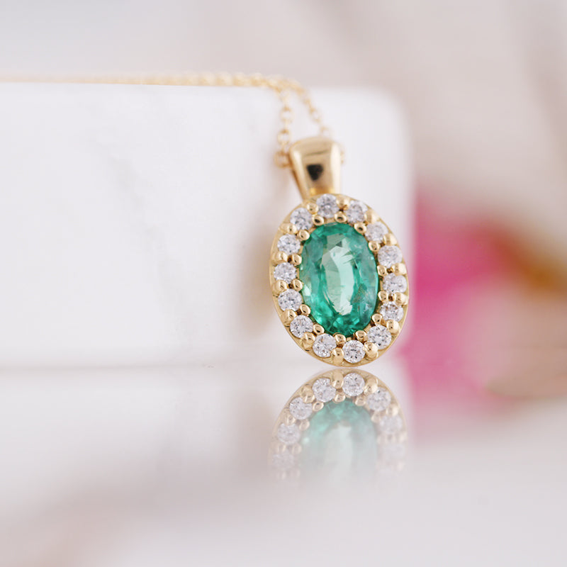 Emerald &amp; Diamond Oval Halo Pendant