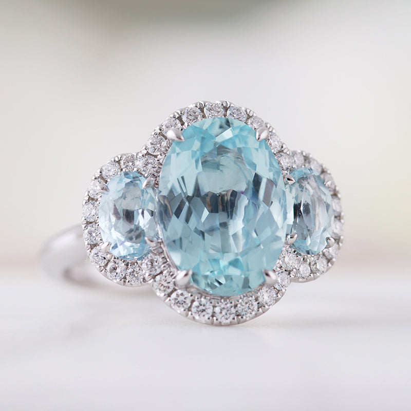 Oval Aquamarine &amp; Diamond Three Stone Halo Ring