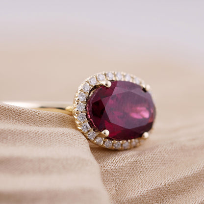 Oval Garnet &amp; Diamond Halo Ring